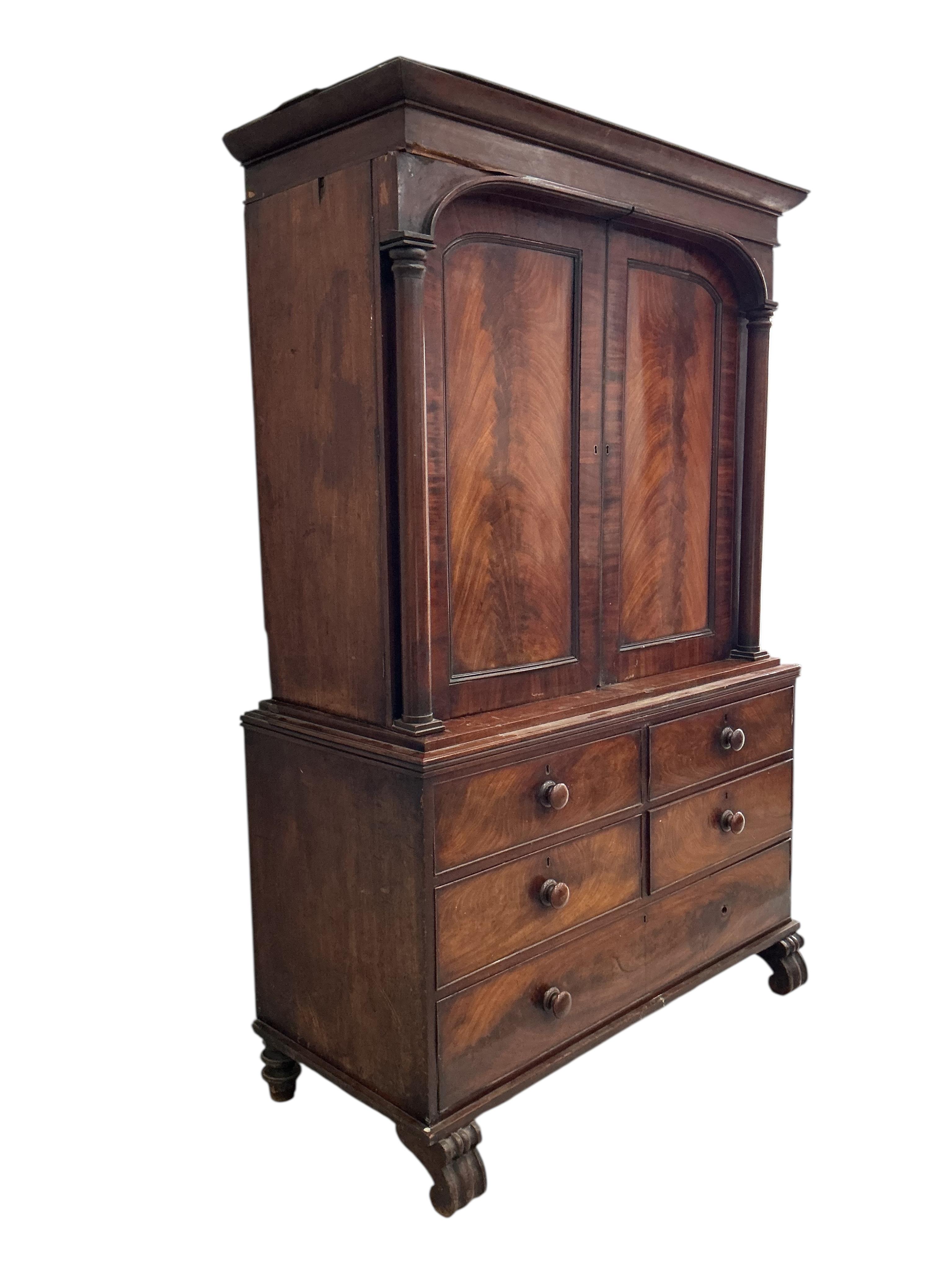 An early Victorian mahogany linen press, width 136cm, depth 62cm, height 211cm